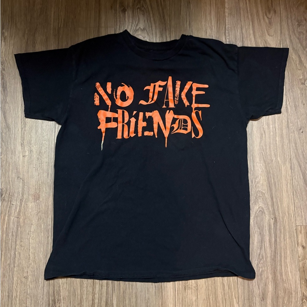 Fashion Nova Black Tee with Bold Orange Text